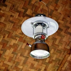 an overhead view of a light fixture on a wood floor