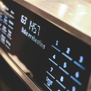 a close up of a microwave with buttons and numbers